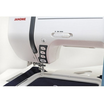 Швейная машина Janome Memory Craft 9900, белый/красный